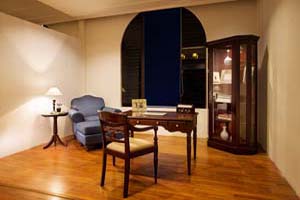 Seville Curio Cabinet and small table with Overstuffed armchairs.
<br> Curio Size:97x43x200H cm.