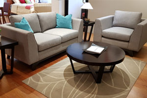 The Carlton provides the best blend of form & comfort. The upholstered paddings provides comfort, whilst softening the strong wooden frame.  Best done in darker wood tones. <br>

<br>Items: <br>Sofa available in 3 seater, 2 seater, and single seater.
<br>Coffee Table -  Size: Diameter 90x40H cm.